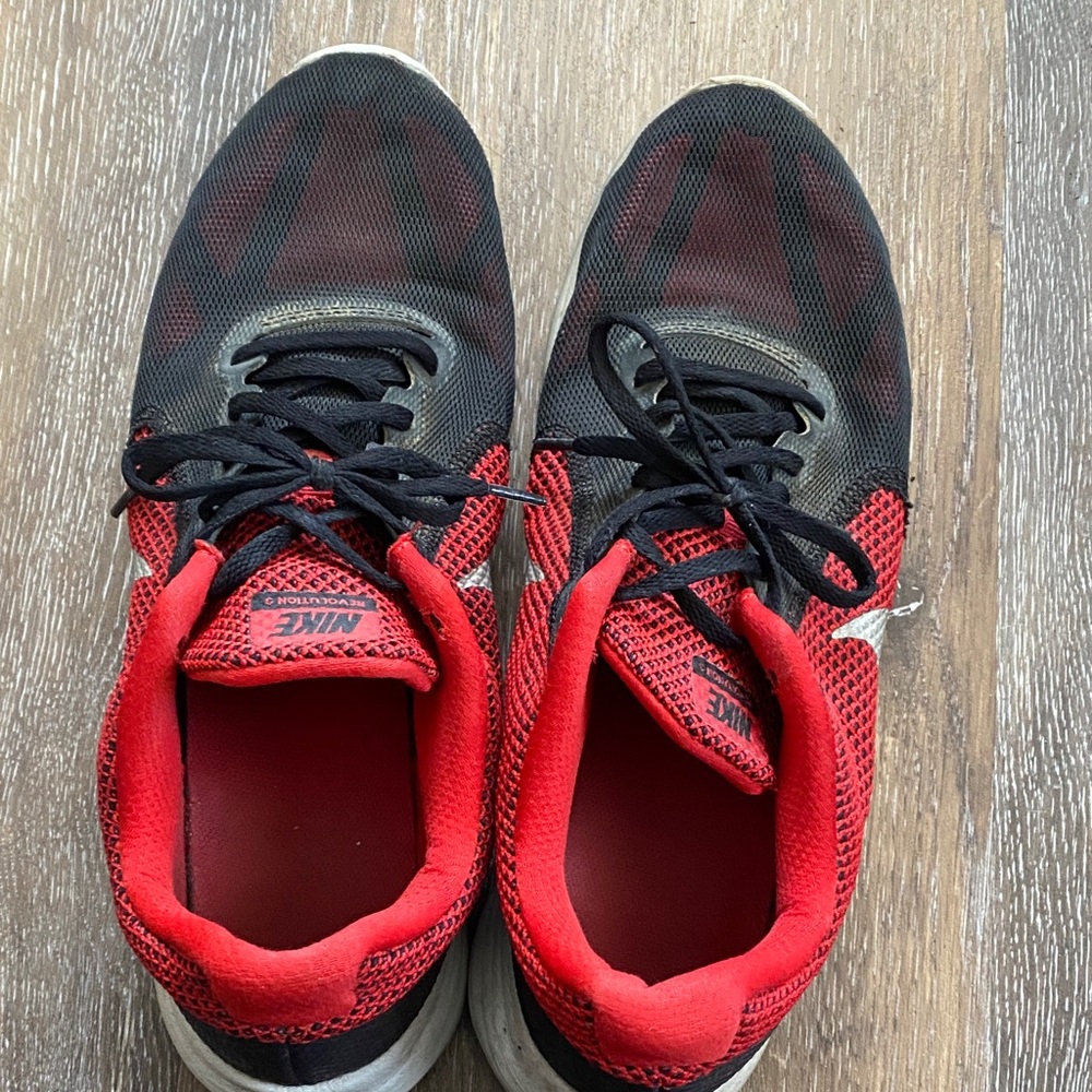 Slightly worn Nike Revolution sneakerd